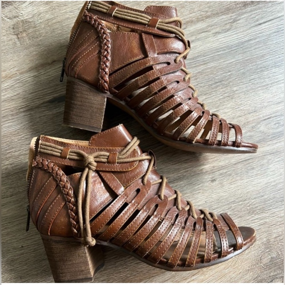 Faux  Leather Brown lace up heel with zipper in back. 2 1/2 “ heel, Size 9